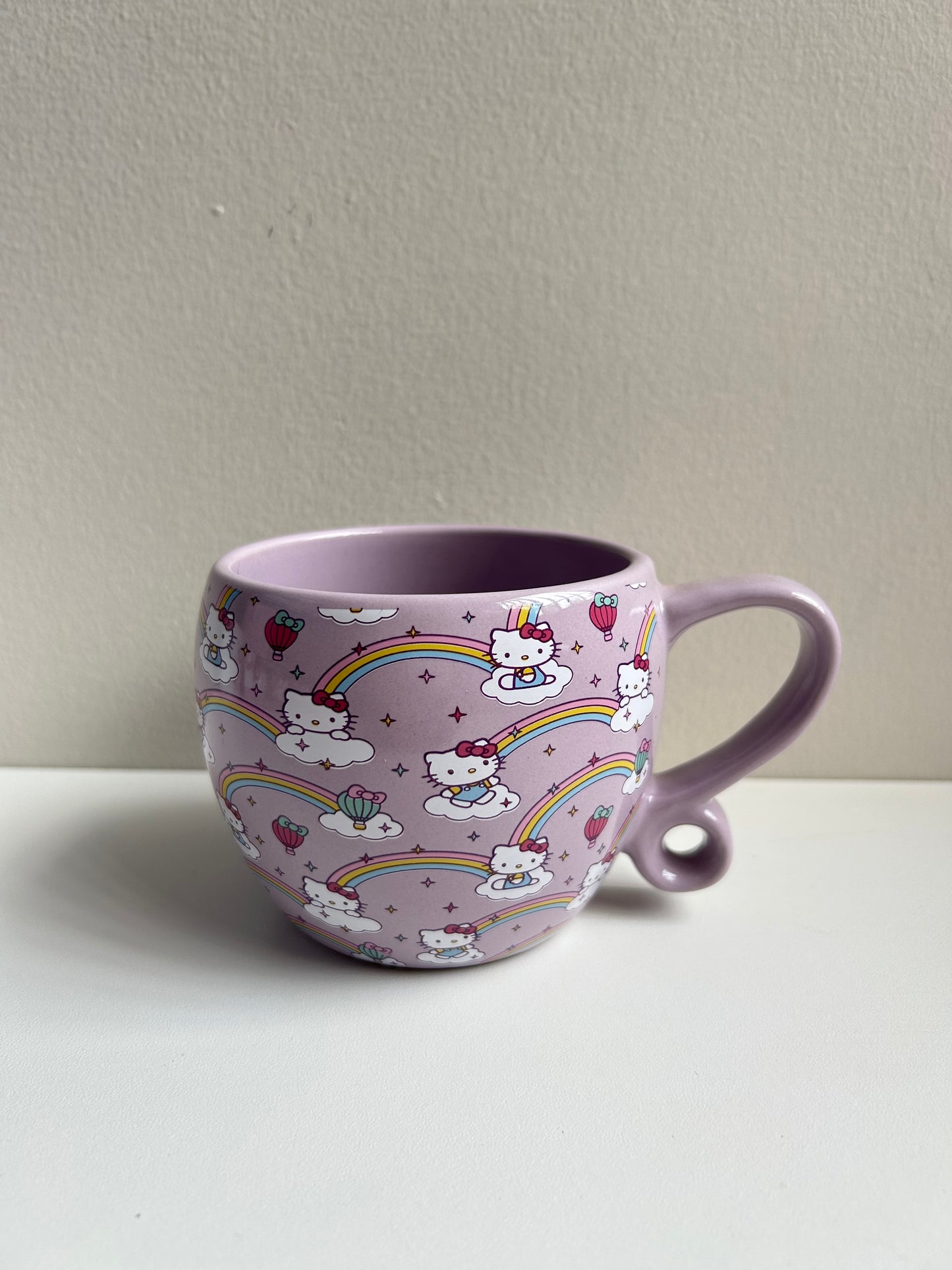 Taza Hello Kitty Arcoíris