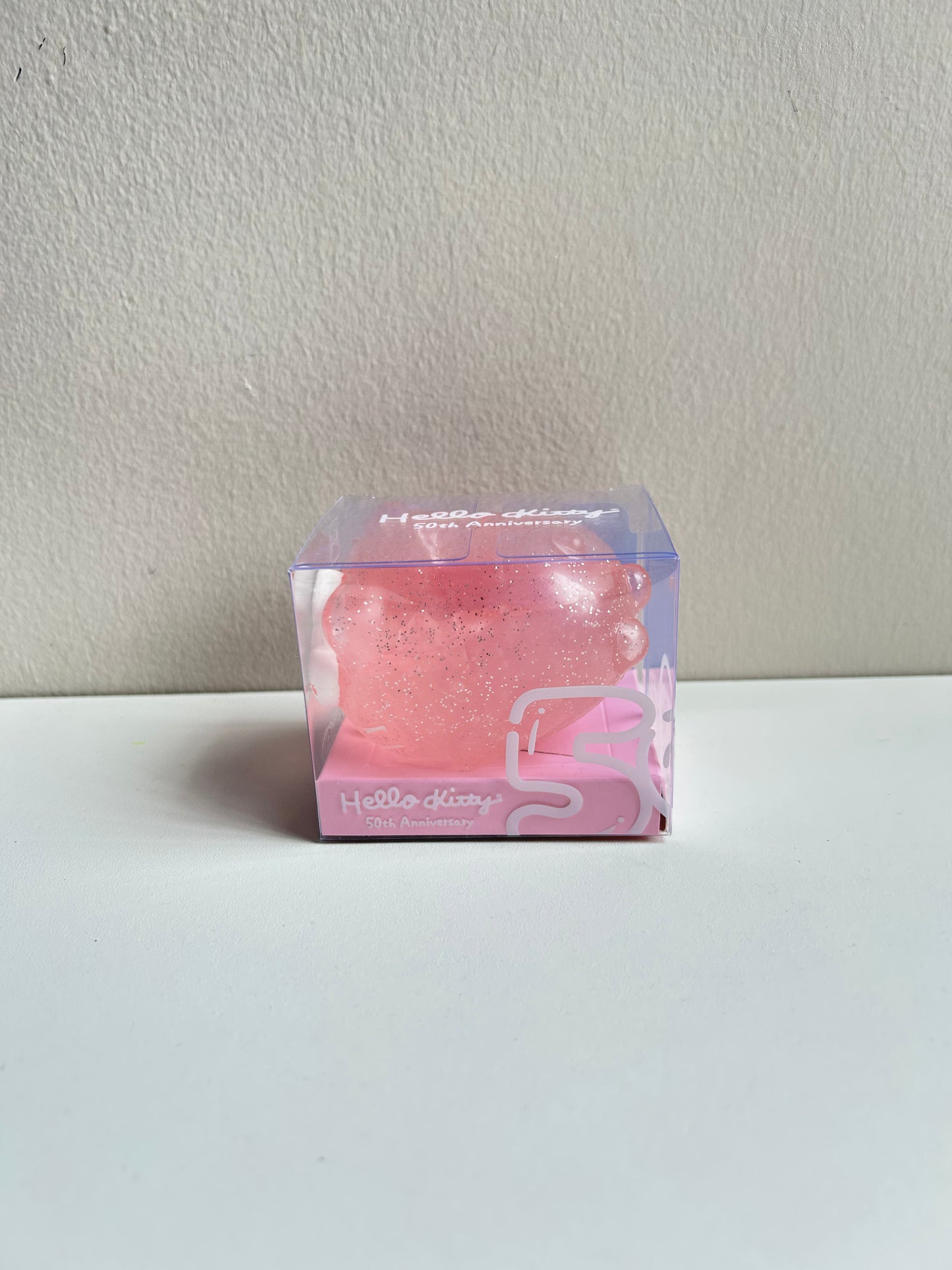 Hamee SquiSHU Sanrio Hello Kitty 50th Anniversary Rosa con brillitos