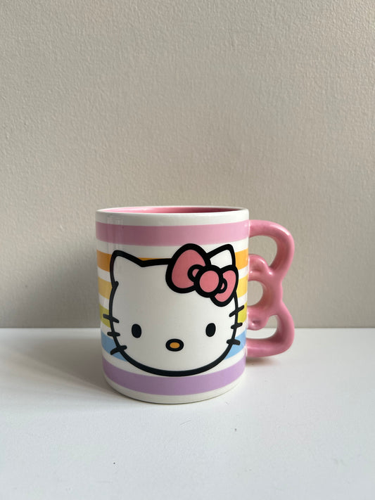 Taza Hello Kitty Agarradera Moño